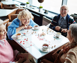 Image of residents playing a board game